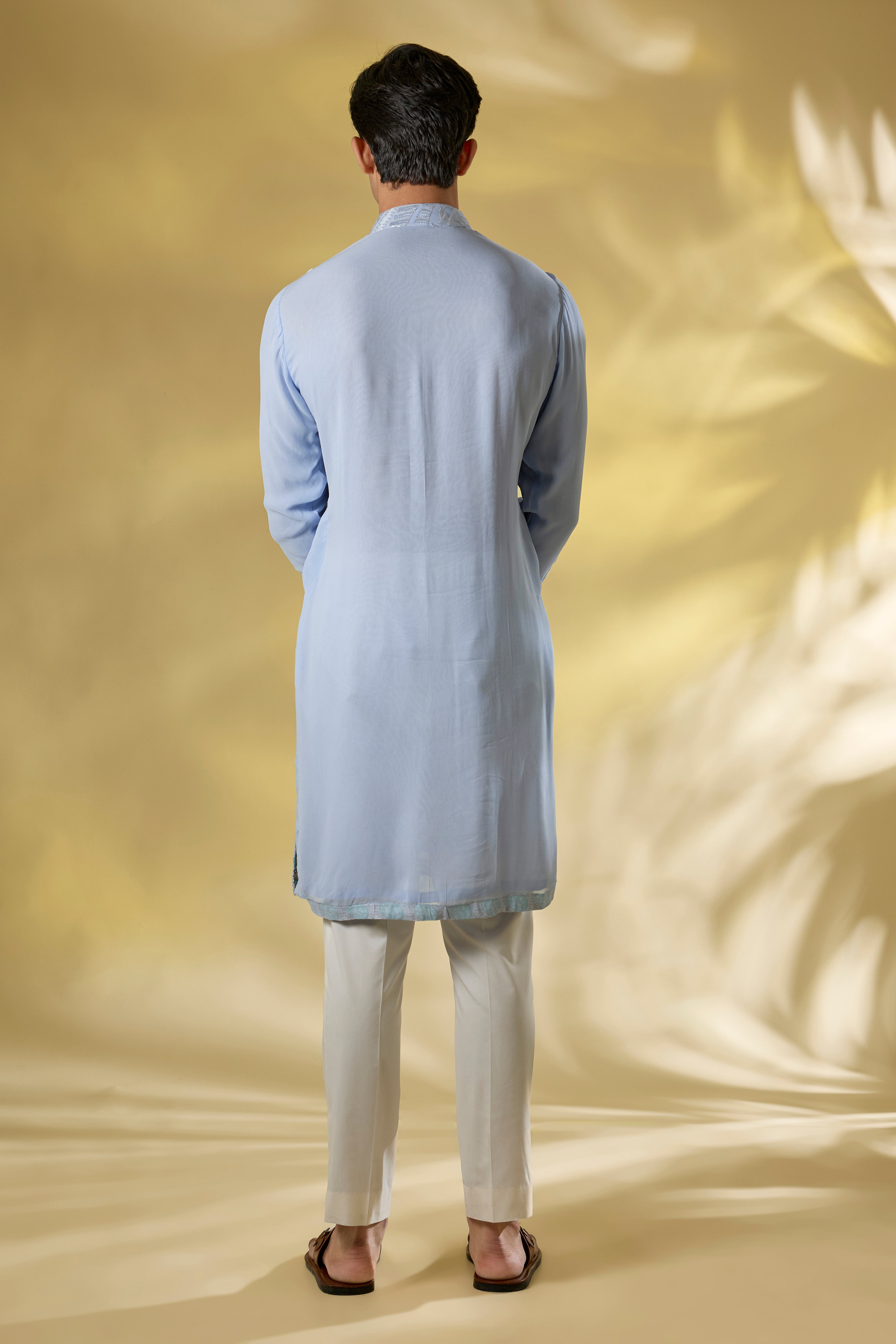 PALE BLUE GORGTTE FRONT EMBO.