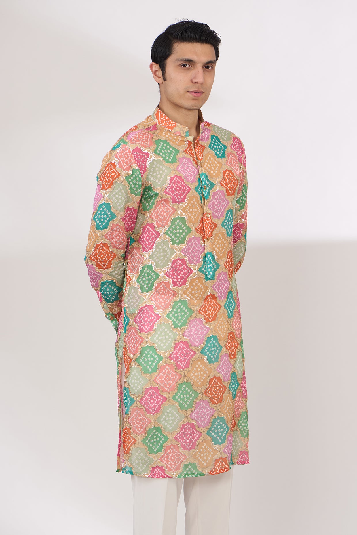 MULTI COLOR BANDHANI WITH GOLD SEQUINS UNLINED KURTA AND COTTON SILK PANTS