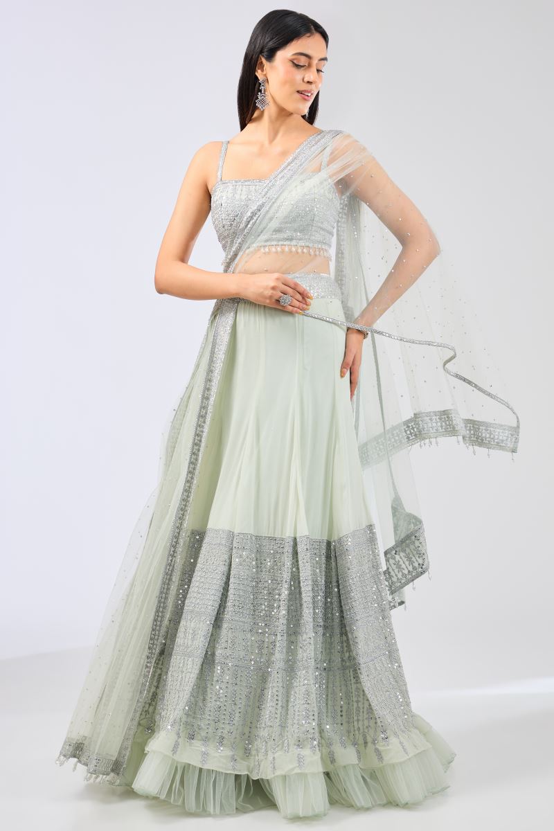 NADIA SAGE GREEN GEORGETTE METAL THREAD JAAL LEHENGA WITH NET ATTACHED DRAPE AND BLOUSE