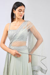 NADIA SAGE GREEN GEORGETTE METAL THREAD JAAL LEHENGA WITH NET ATTACHED DRAPE AND BLOUSE