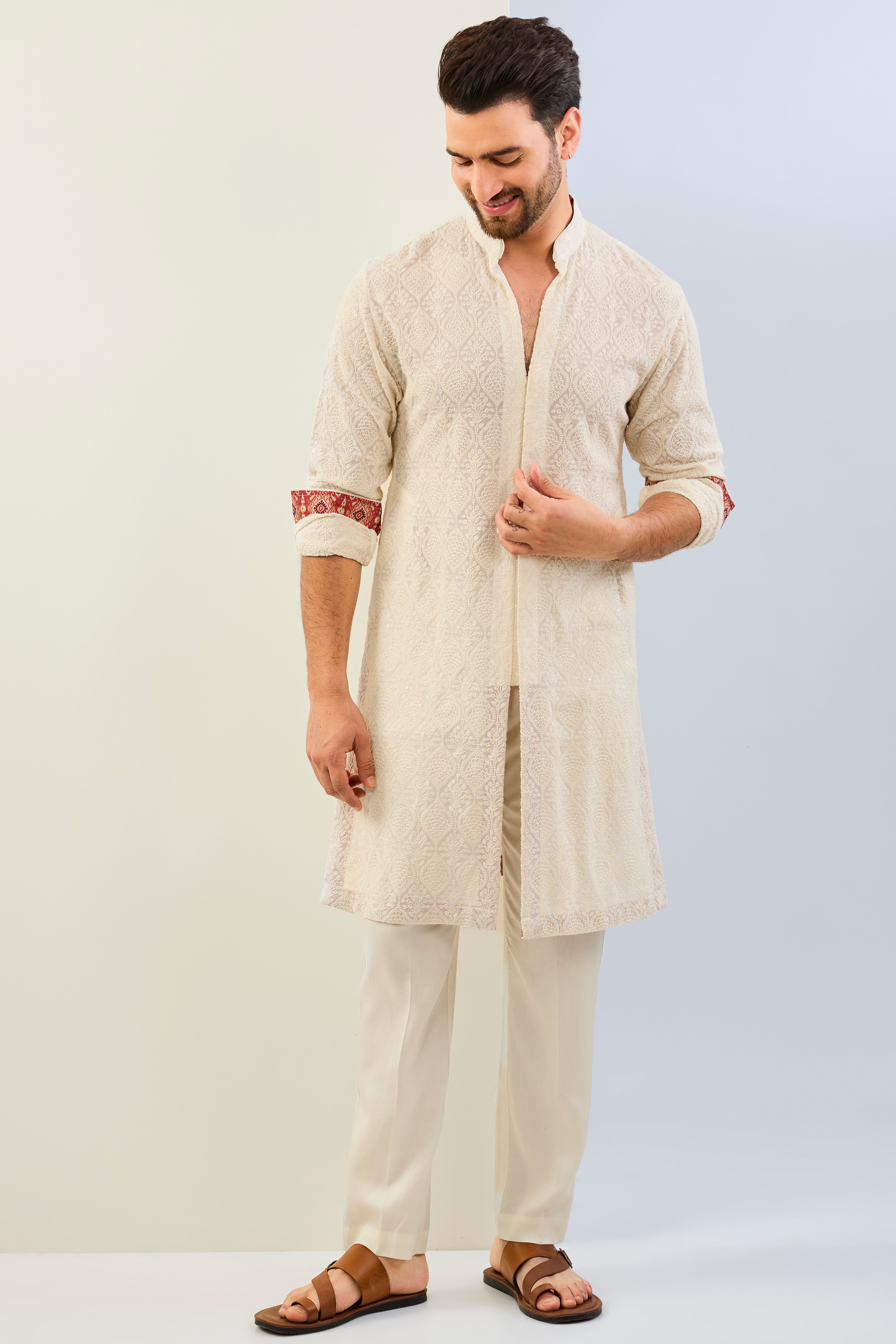 IVORY GORGETTE THREAD EMBOIDERED UNLIED KURTA WITH PRINT DETAILING AND MATCHING COTTON SILK PANT