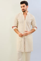 IVORY GORGETTE THREAD EMBOIDERED UNLIED KURTA WITH PRINT DETAILING AND MATCHING COTTON SILK PANT