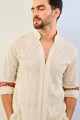 IVORY GORGETTE THREAD EMBOIDERED UNLIED KURTA WITH PRINT DETAILING AND MATCHING COTTON SILK PANT