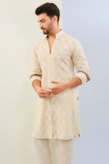 IVORY GORGETTE THREAD LEAF EMBOIDERED UNLIED KURTA WITH PRINT DETAILING AND MATCHING COTTON SILK PANT