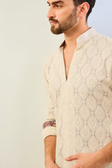 IVORY GORGETTE THREAD LEAF EMBOIDERED UNLIED KURTA WITH PRINT DETAILING AND MATCHING COTTON SILK PANT