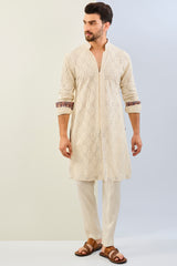 IVORY GORGETTE THREAD LEAF EMBOIDERED UNLIED KURTA WITH PRINT DETAILING AND MATCHING COTTON SILK PANT