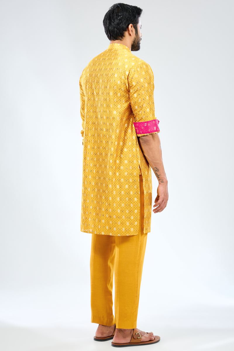 YELLOW ZARI BOOTI AND SEQUIN BANDHANI KURTA WITH RANI BANDHANI DETAILING AND COTTON SILK PANTS