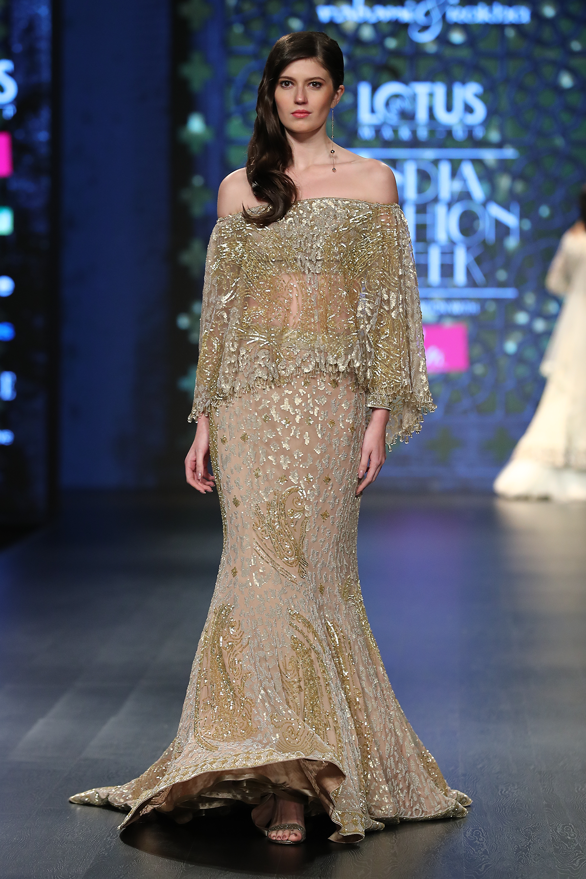 Gold Foil Georgette 6 Kali Fully Hand Embroidered A.P Burst Jaal Trail Skirt W. Fully Hand Embroidered Net Cape Attached Net Blouse