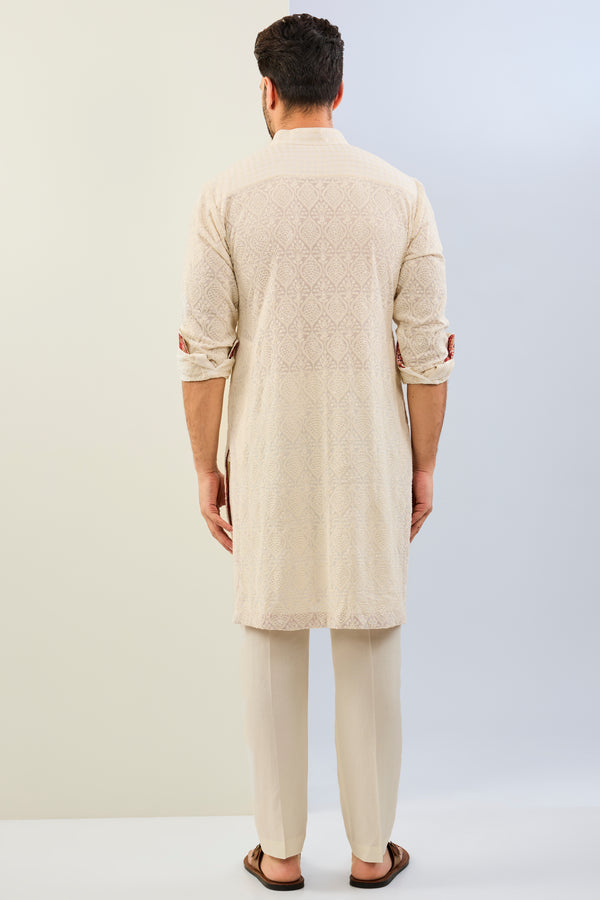 IVORY GORGETTE THREAD EMBOIDERED  UNLIED KURTA WITH PRINT DETAILING AND MATCHING COTTON SILK PANT