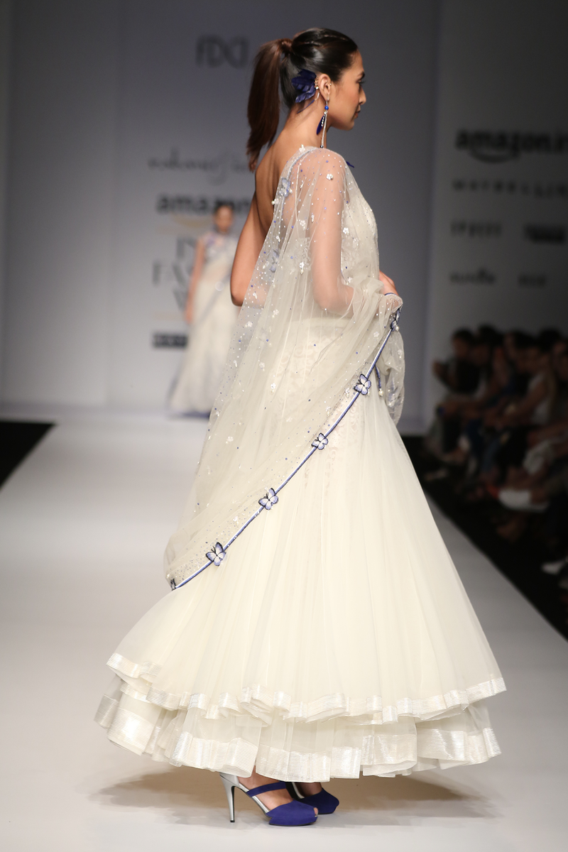 Ivory Net Poof W/ Sequin Bustier Gown W. Net Butterfly Border Sari Drape W. Lace Trouser