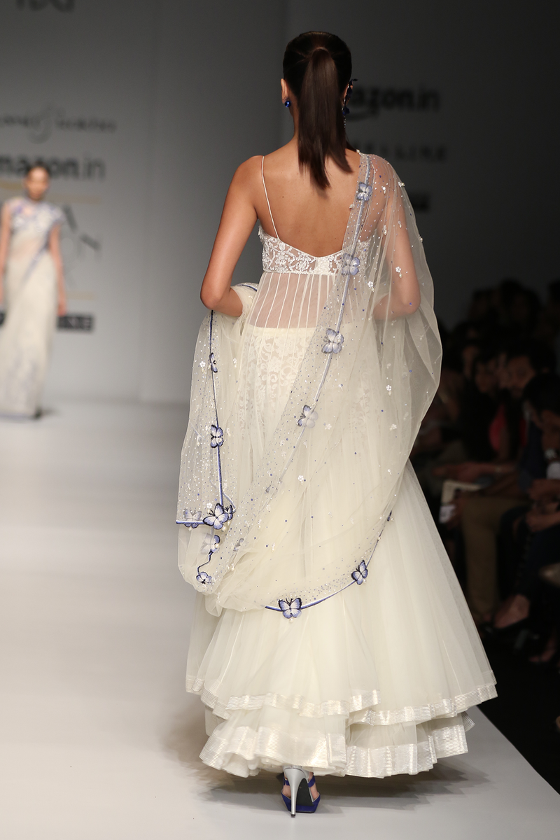 Ivory Net Poof W/ Sequin Bustier Gown W. Net Butterfly Border Sari Drape W. Lace Trouser